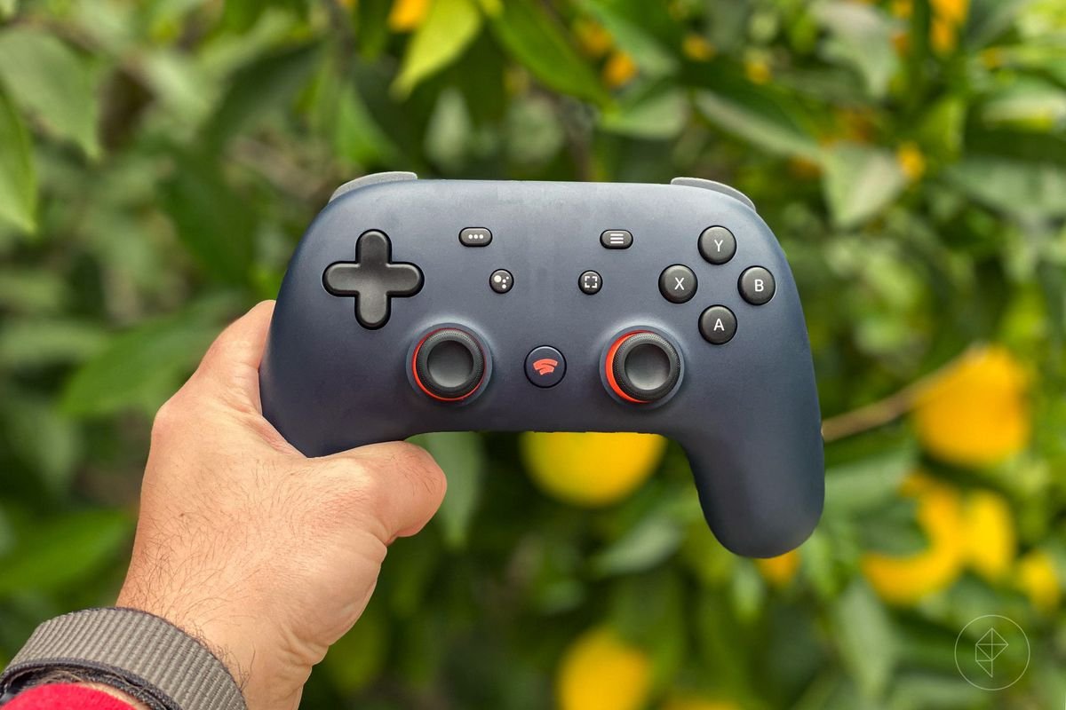 Google Stadia controller being held