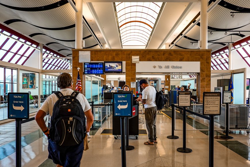 man enters the tsa precheck line at airport