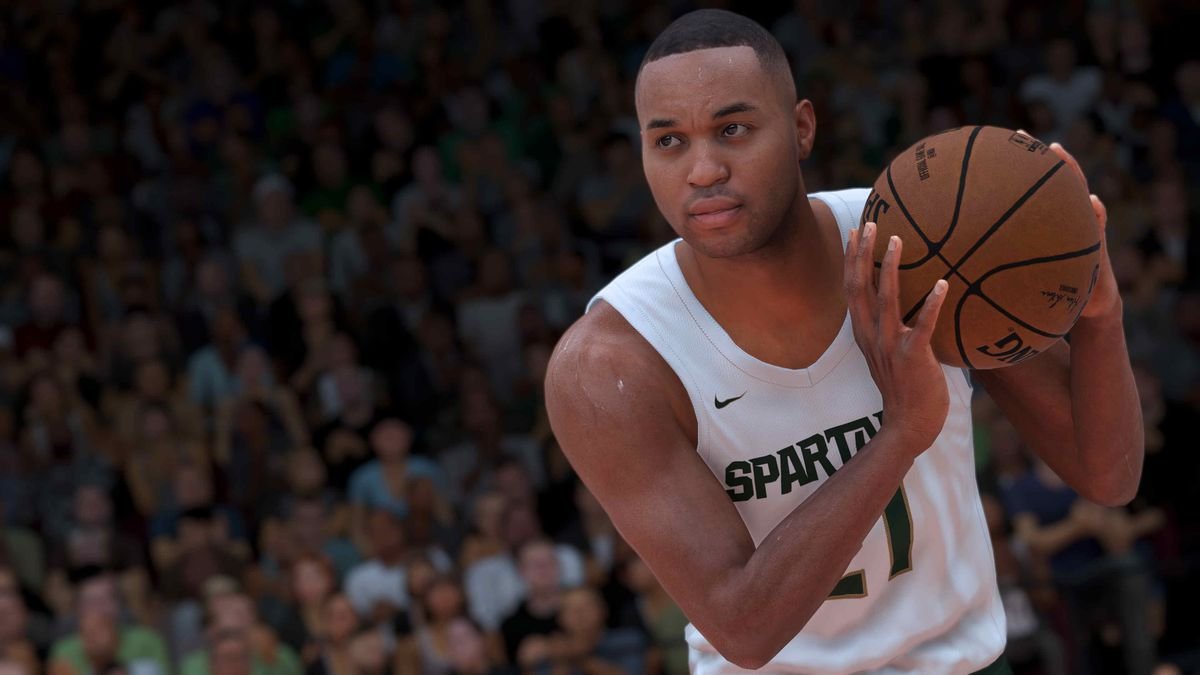 A fictitious player for the Michigan State Spartans cradles a basketball in NBA 2K21