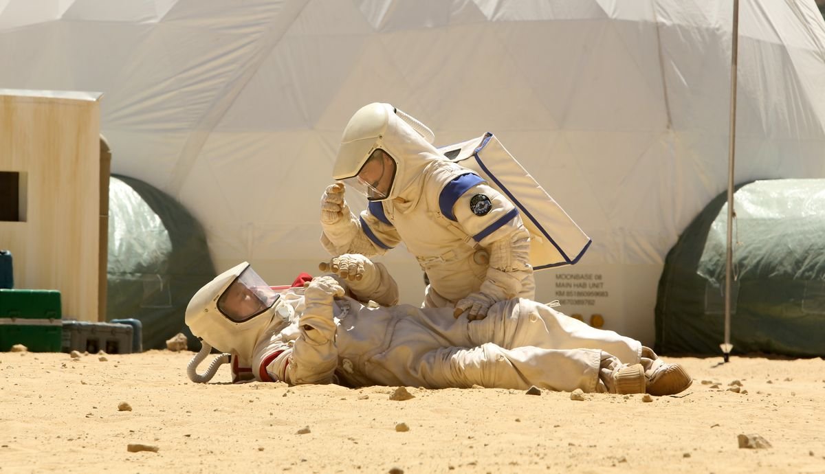 John C. Reilly and Tim Heidecker in spacesuits in Moonbase 8