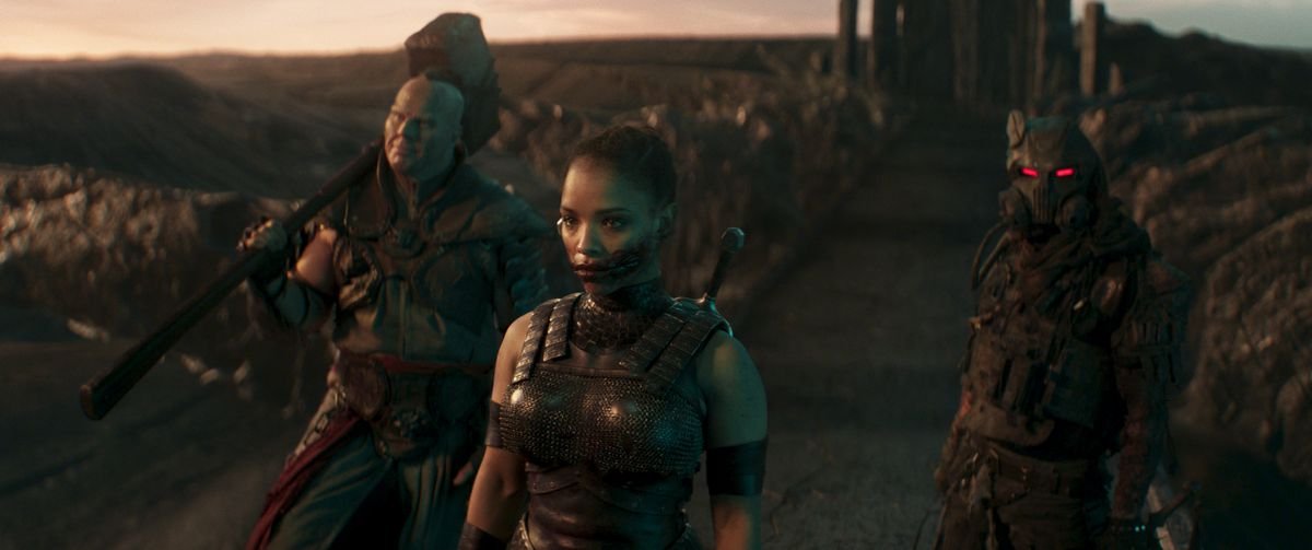 Nathan Jones as Reiko, Sisi Stringer as Mileena, and Daniel Nelson as Kabal in Mortal Kombat