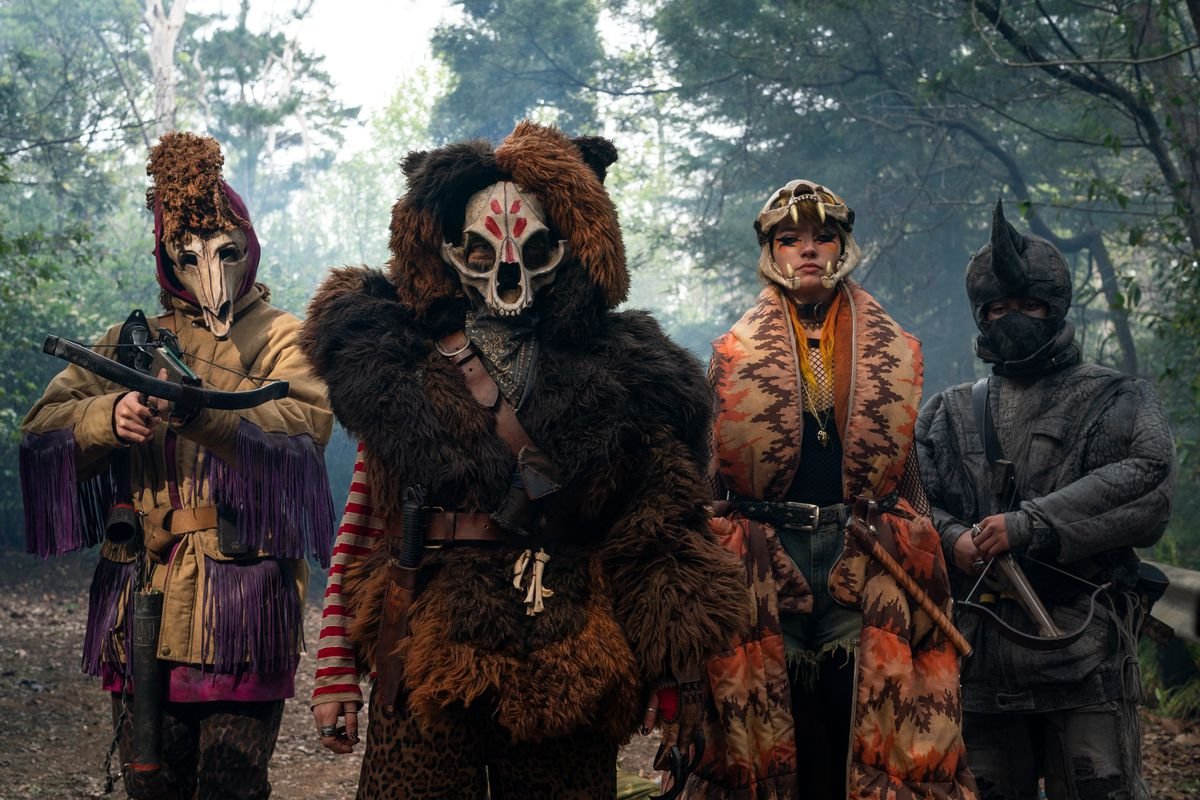 Sweet Tooth’s Animal Army, four people dressed in elaborate animal costumes.