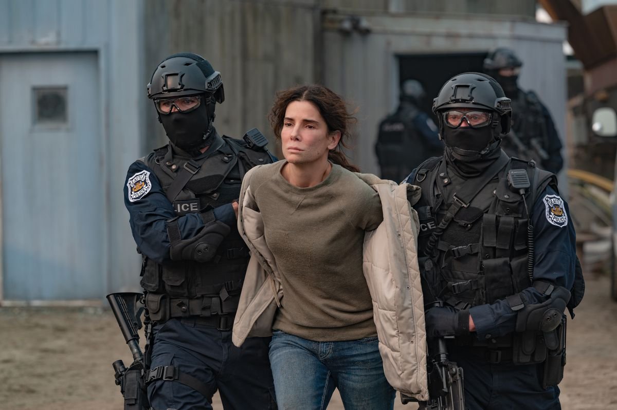 Sandra Bullock’s character being arrested in a still from “The Unforgivable”