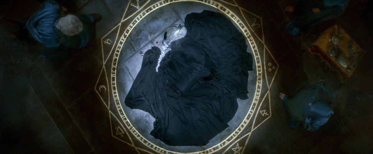 Dream, in his helmet and robe, is captured in the occult circle in Netflix’s The Sandman