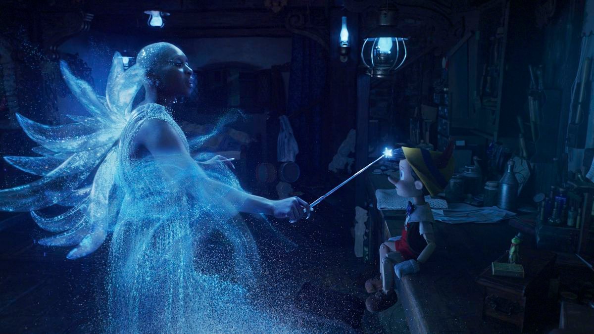 Cynthia Erivo, glowing in a blue dress made of light, as the Blue Fairy in Disney’s live-action remake of 1940’s animated classic Pinocchio