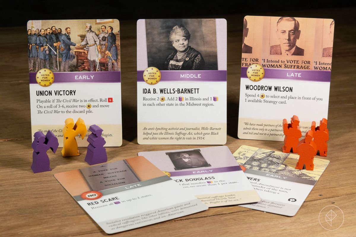 Union Victory, Ida B. Wells-Barnett, Woodrow Wilson, Red Scare, and other cards from Votes for Women. Each shows its allied faction, key art, and gameplay effects. There’s also some clever little suffragette-shaped meeples.