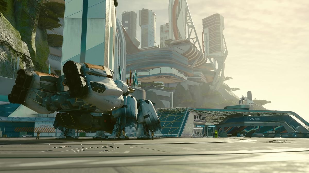 in a screenshot from Starfield, a spaceship is parked on a landing area in a futuristic city called New Atlantis