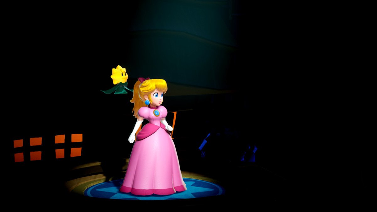 A spotlight is on Princess Peach, wearing her iconic pink dress, with a sparkle sidekick hovering behind her.
