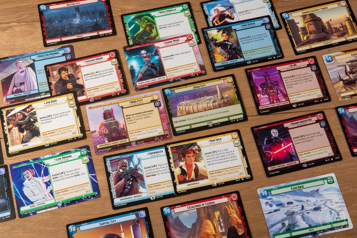 An assortment of cards, including Jyn Erso, Iden Versio, Grand Inquisitor, and Boba Fet. In the center is Jedha City, a stunt base with less health than the rest.